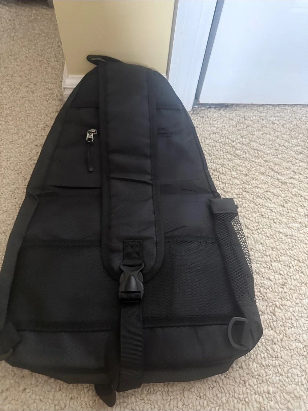 New Women/Men's Black sling pickleball Backpack with Reflective Trim.